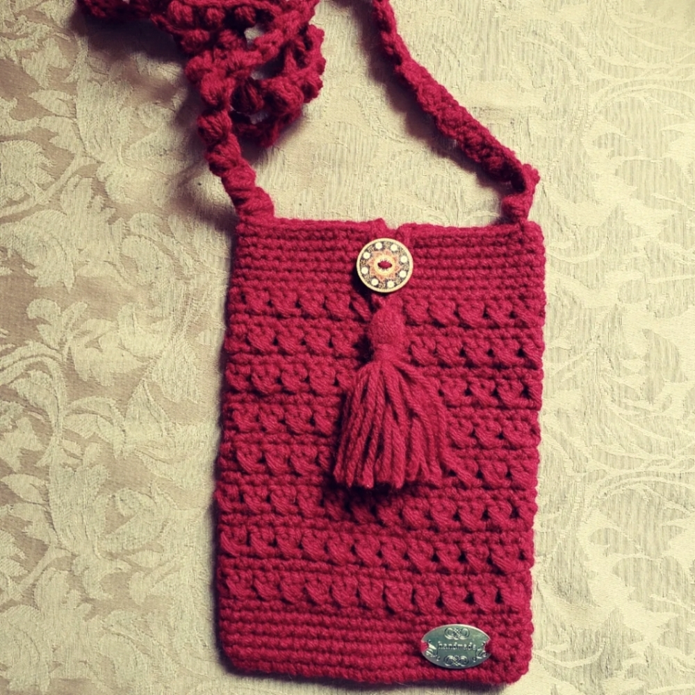 Cross body,unlined cell phone bag. Crocheted by me and fresh off my hook.